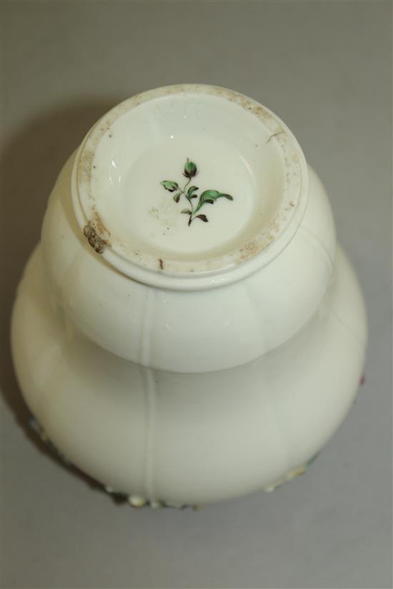 A Mennecy porcelain floral encrusted ogee-shaped vase and cover, c.1760, 17.5cm